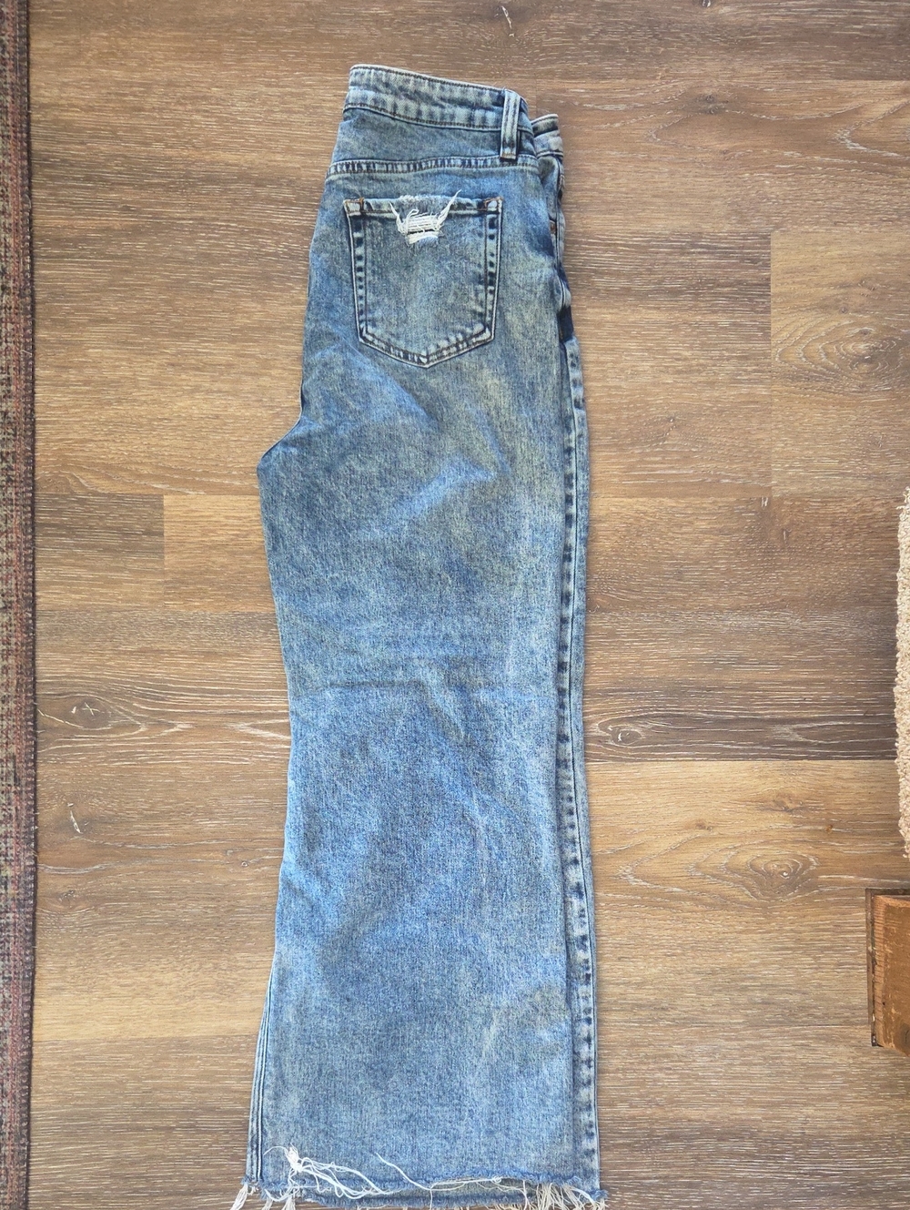 Women’s Light Blue Flare Jeans with Raw Hem